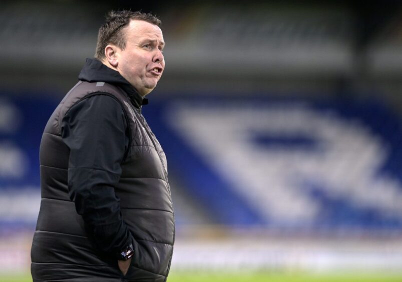 Inverness Caledonian Thistle head coach Scott Kellacher shouts instructions to his team during the 4-1 SPFL League One defeat against Cove Rangers at the Caledonian Stadium, Inverness, on December 28. 