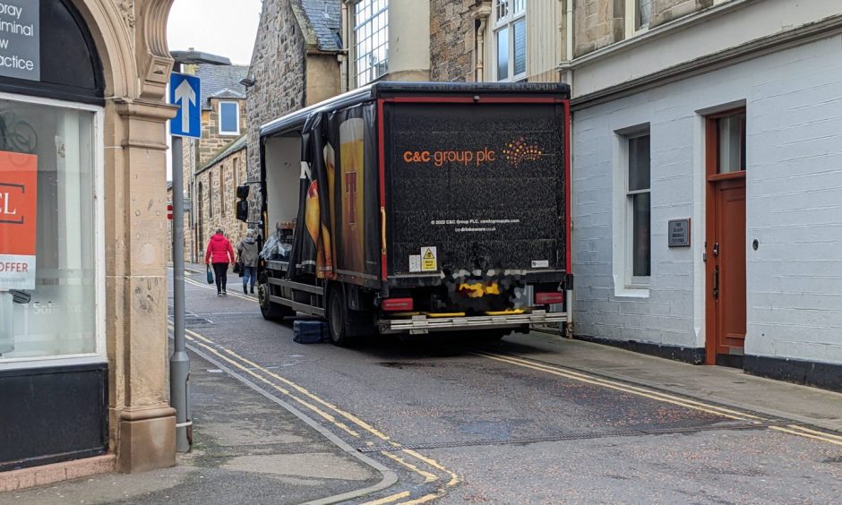 Delivery lorry parked on double yellow lines. 