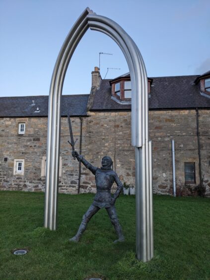 Wolf of Badenoch statue in Elgin. 