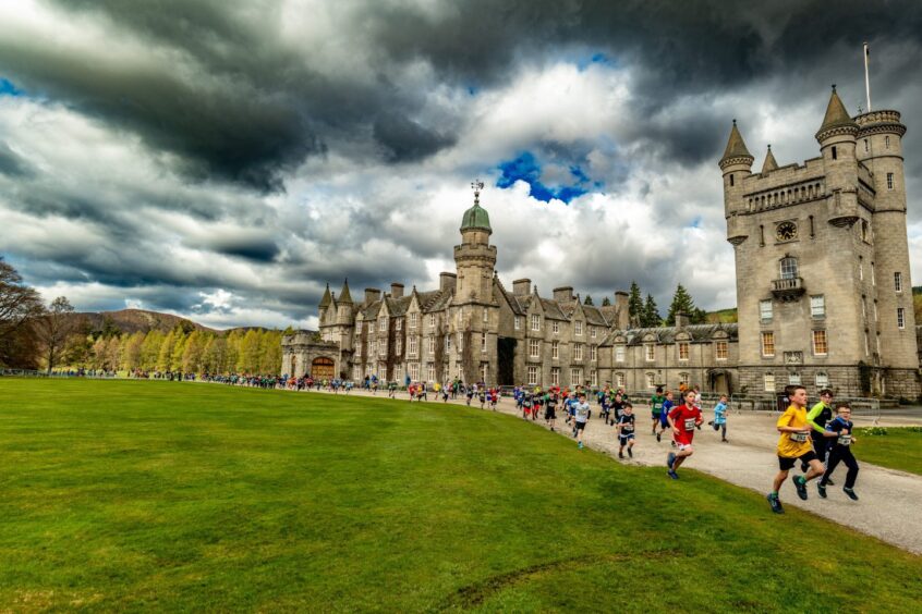 Run Balmoral runners go past Balmoral Castle