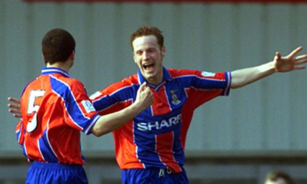 Martin Bavidge celebrates after scoring the only goal of the game for Caley Thistle against Airdrie in March 2002.