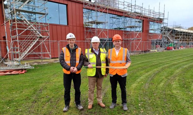 Colin Henderson, principal architect, Highland Council; City leader Councillor Ian Brown; and Ruari Davidson. CEO of the Camanachd Association, at the Bught Stadium which is undergoing refurbishment.