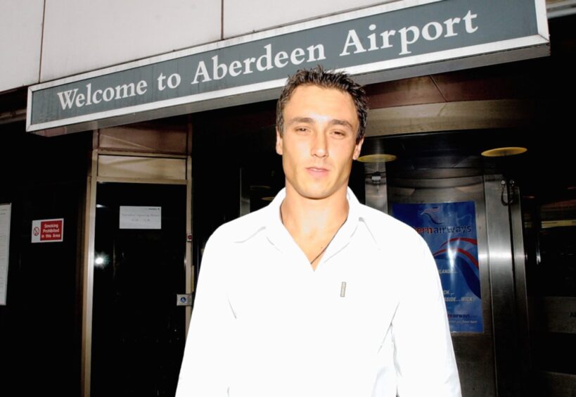 Giorgos Barkoglou at Aberdeen airport after arriving for a trial with Aberdeen FC in 2003.