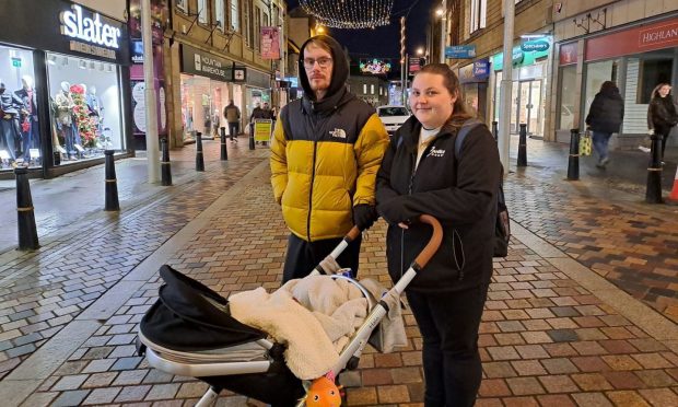 Inverness family on the High Street.