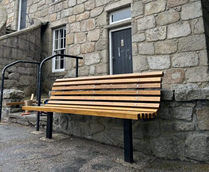 The bench as it is now outside the Town House, looking very smart.