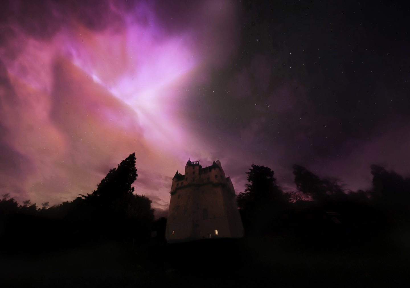 Torin Liversedge photo of a castle with the northern lights behind it