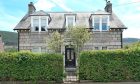 The front elevation of Rannagowan a traditional granite property in Ballater.