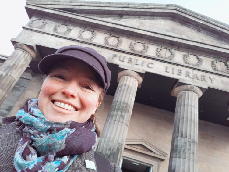 Barbara Henderson outside Inverness Library.