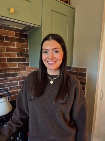 Emma Robertson in the kitchen of her home at 269 Union Grove.