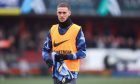 Alfie Dorrington of Tottenham Hotspur after the full time whistle in the FA Cup tie against
Tamworth. Image: Shutterstock.