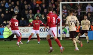 Scott Bright, left, scores Brechin City's goal against Hearts in the Scottish Cup. Photos by SNS.