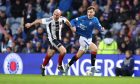 Fraserburgh's Bryan Hay, left, battles with Findlay Curtis of Rangers.