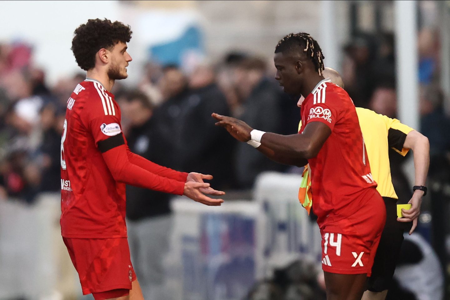 Aberdeen attacker Pape Gueye (right) is substituted on for Dante Polvara to end a four month injury nightmare. Image: Shutterstock 