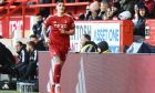 Aberdeen defender Slobodan Rubezic goes straight dowfn the tunnel after being substituted after 39 minutes in the 3-0 loss to St Mirren. Image: Shutterstock