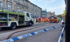 Fire crews at the scene of the Poundland blaze in Elgin.