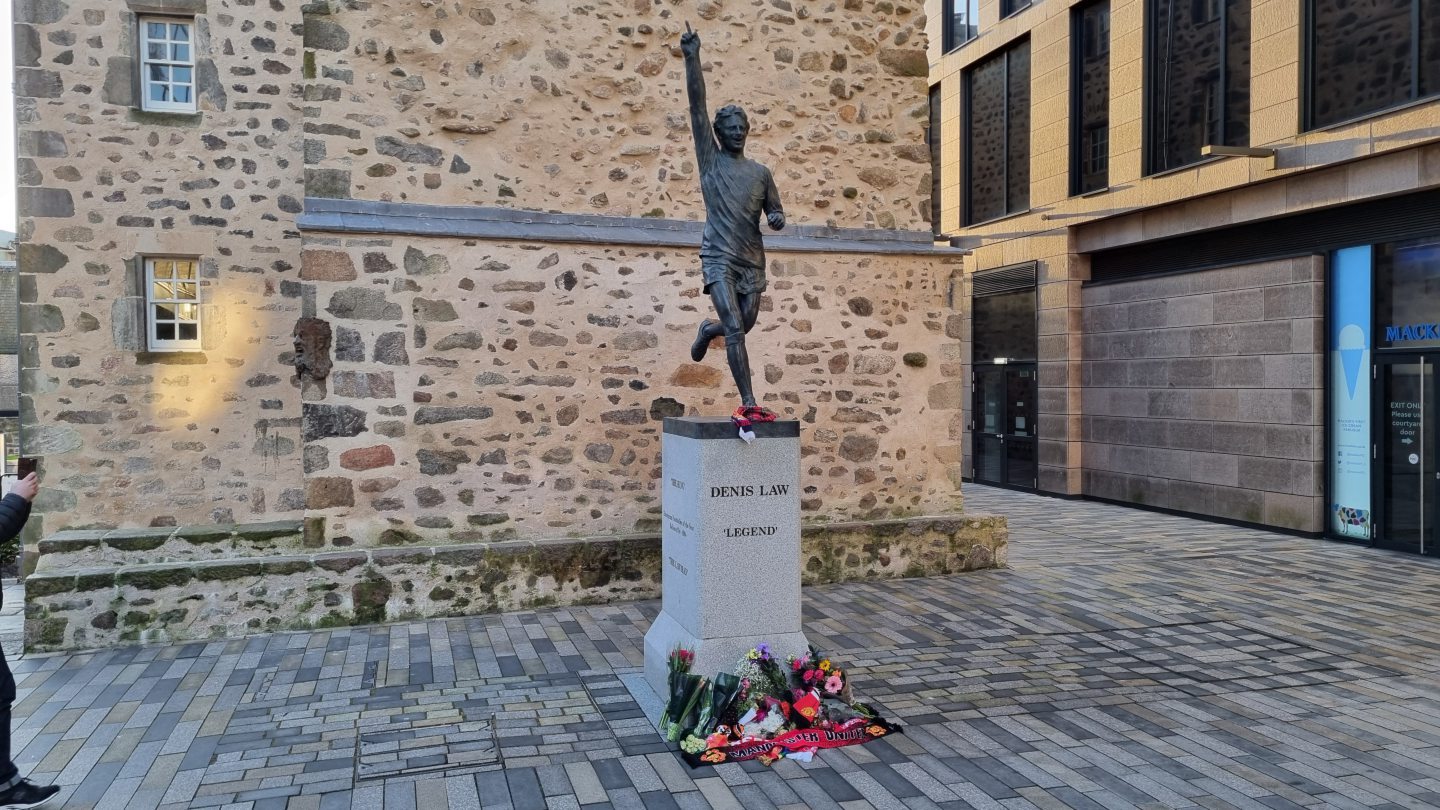 Tearful mourners pay tribute to Denis Law at Aberdeen statue