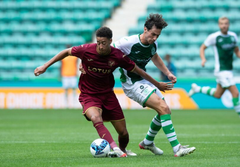 Jonathan Tomkinson takes a touch away from a Hibernian player for Norwich City, during a pre-season friendly at Easter Road last summer.