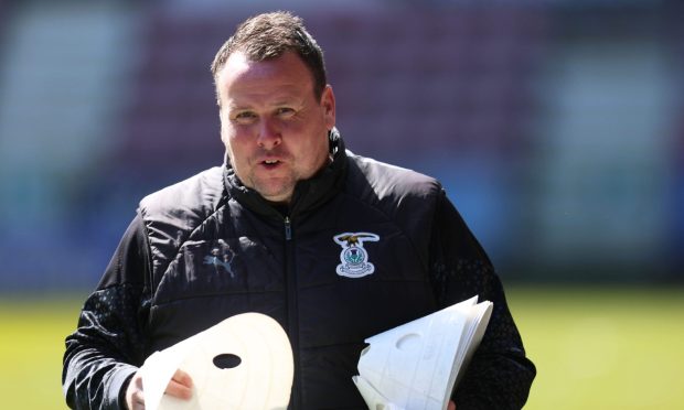 Inverness Caledodonian Thistle head coach Scott Kellacher putting out markers for the team before a SPFL Championship fixture against Dunfermline Athletic at East End Park on April 27, 2024.