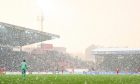 Snow falls during the William Hill Premiership match between Aberdeen and Ross County at Pittodrie, on January 2, 2025. Image: SNS.