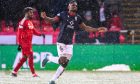 Ross County's Akil Wright celebrates scoring to make it 1-0 against Aberdeen FC at Pittodrie Stadium.