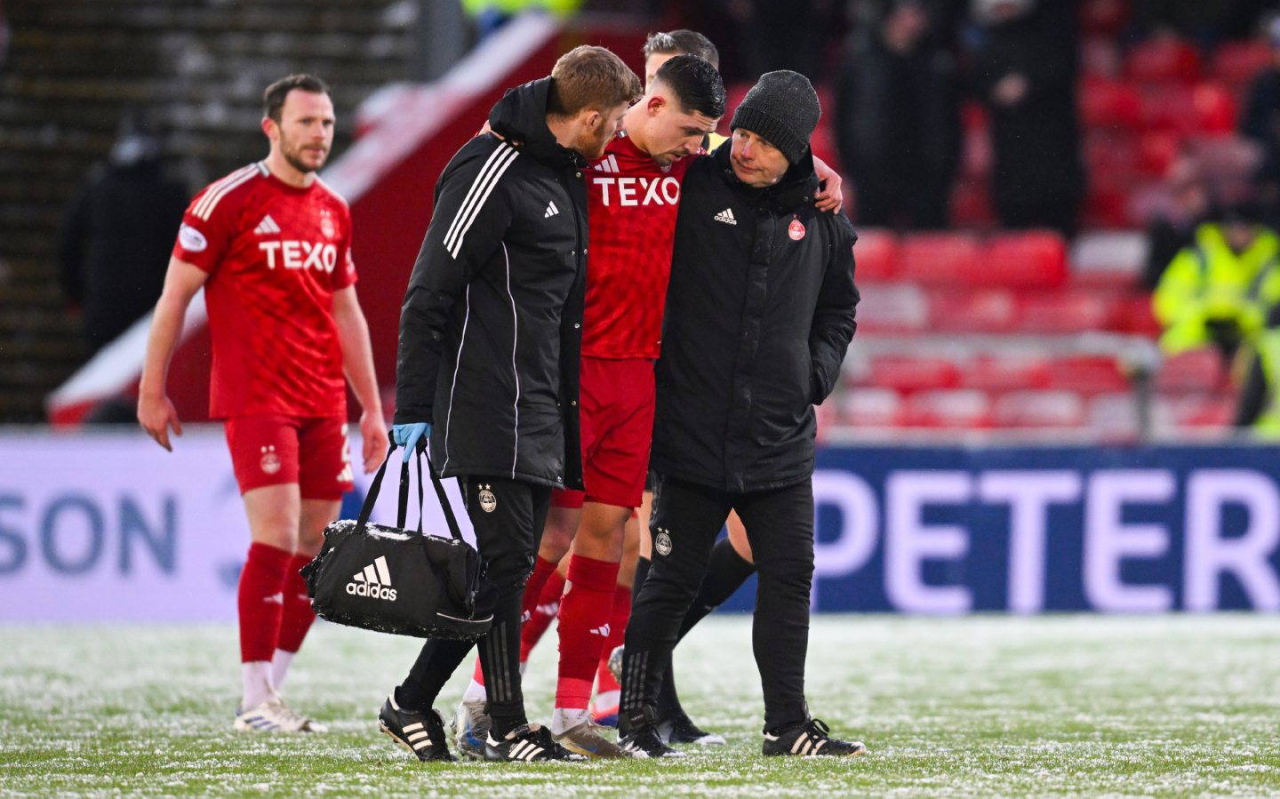 Aberdeen's Ester Sokler goes off injured during a Premiership match against Ross County on January 2. Image: SNS 