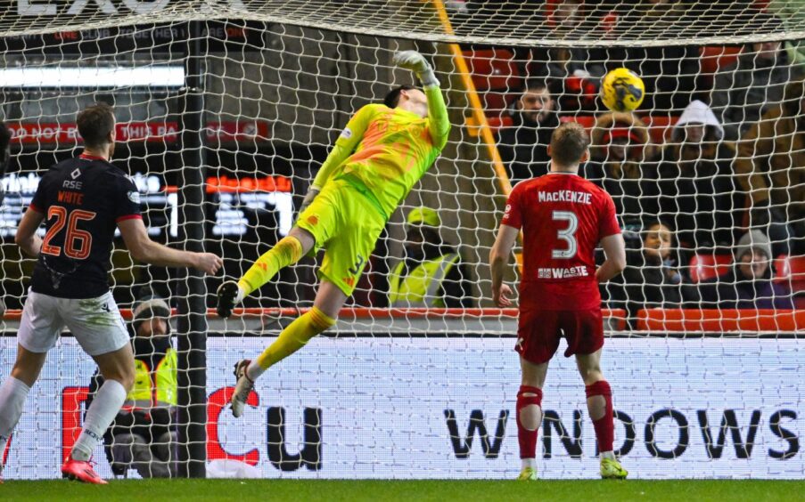 Aberdeen FC goalie Ross Doohan is beaten as Ross County's Noah Chilvers scores to make it 2-1.