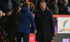 Aberdeen manager Jimmy Thelin (R) and Ross County manager Don Cowie shake hands at full-time. Image: SNS.