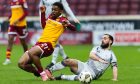 Aberdeen's Graeme Shinnie (R) and Motherwerll's Marvin Kaleta in action during a 2-0 loss at Fir Park. Image: SNS