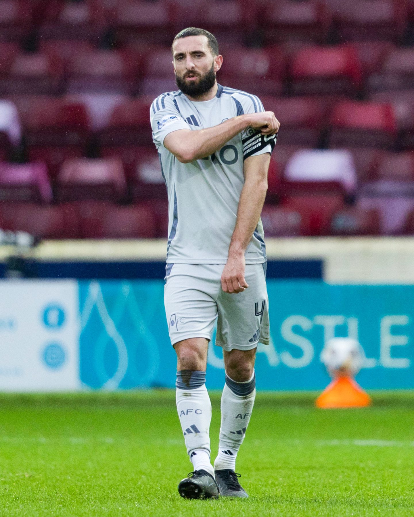 Aberdeen's Graeme Shinnie looks dejected as Motherwell's Ewan Wilson scores to make it 1-0 . Image: SNS 