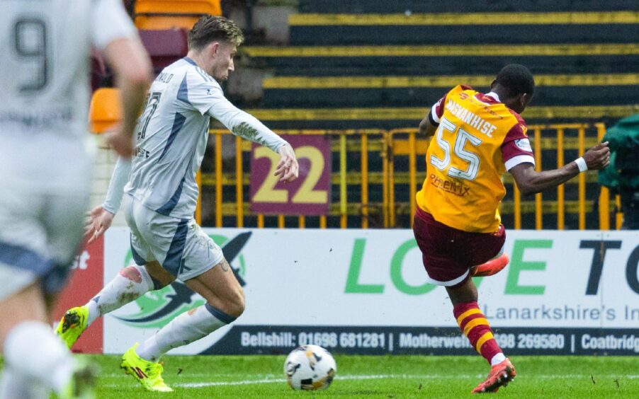 Motherwell's Tawanda Maswinhise scores to make it 2-0 against Aberdeen. Image: SNS