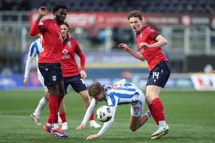 Nohan Kenneh (left) and Jack Grieves in action for Ross County against Kilmarnock.