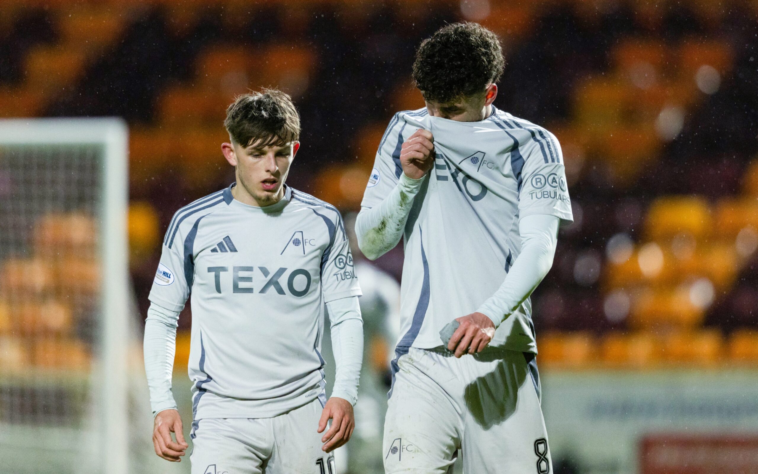 Aberdeen's Leighton Clarkson (L) and Dante Polvara look dejected at full time after the 2-0 loss at Motherwell.