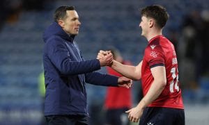 Don Cowie congratulates George Harmon following his winner against Kilmarnock. Image: SNS