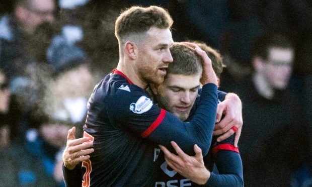 Kieran Phillips (right) celebrates with Jordan White who netted a penalty against Celtic. Image: SNS