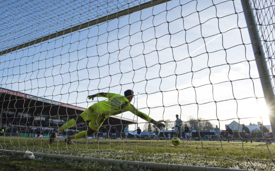 Celtic's Arne Engels scores to make it 3-1 from his stoppage-time penalty before Luke McCowan added a fourth goal in Saturday's 4-1 victory for the champions at the Global Energy Stadium.