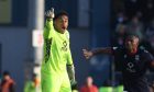 Ross County goalkeeper Jordan Amissah points to his team-mates during the 4-1 SPFL Premiership defeat against Celtic on Saturday, January 11, 2025.