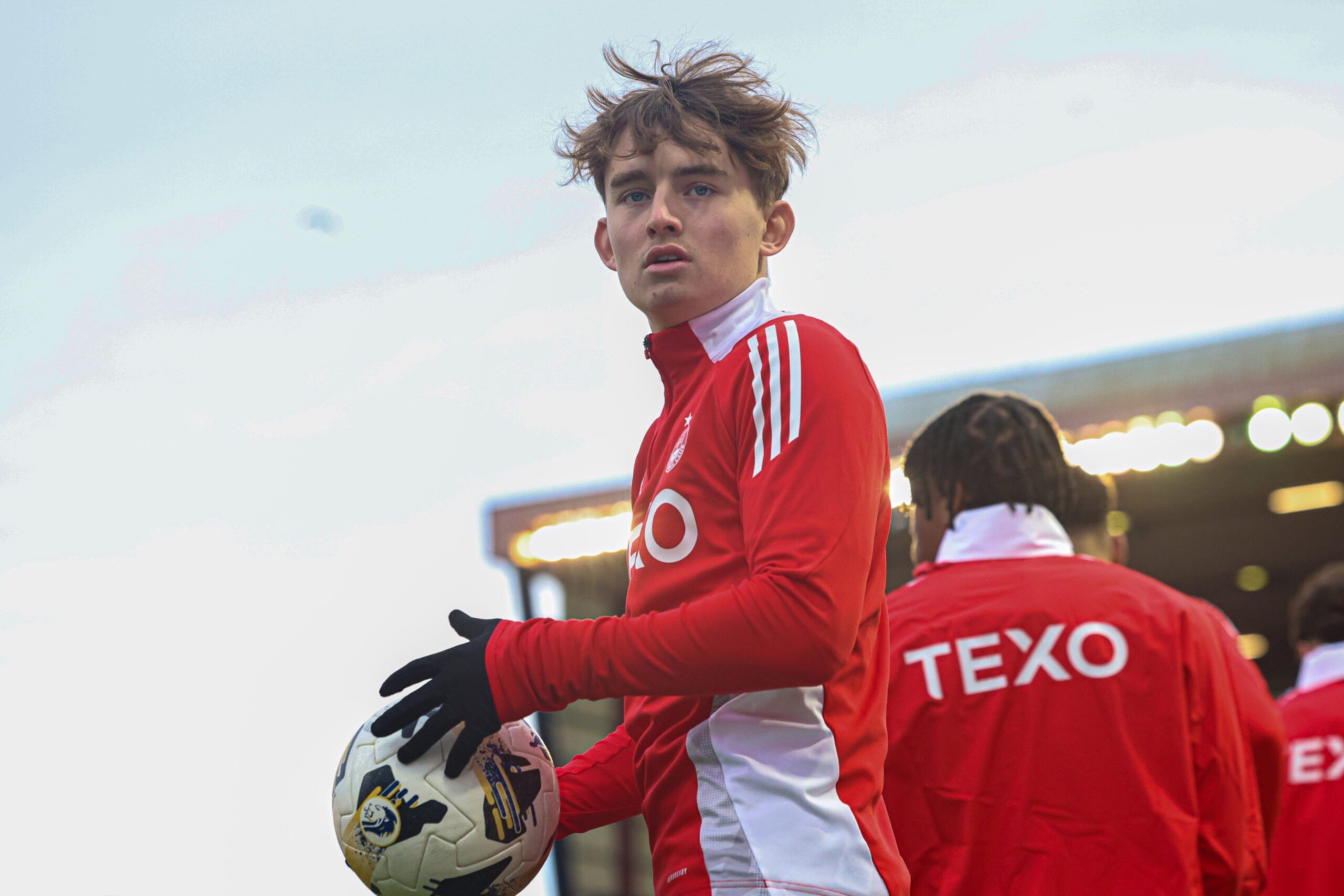 Aberdeen's Fletcher Boyd warms up ahead of the 0-0 draw with Hearts at Pittodrie. Image: SNS 