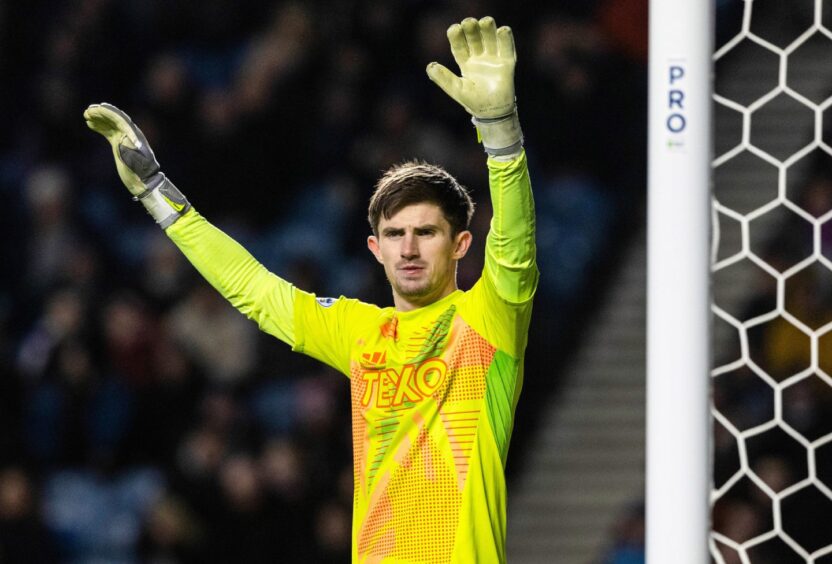 Aberdeen goalkeeper Ross Doohan made several saves to keep his side in the game at Ibrox. Image: SNS