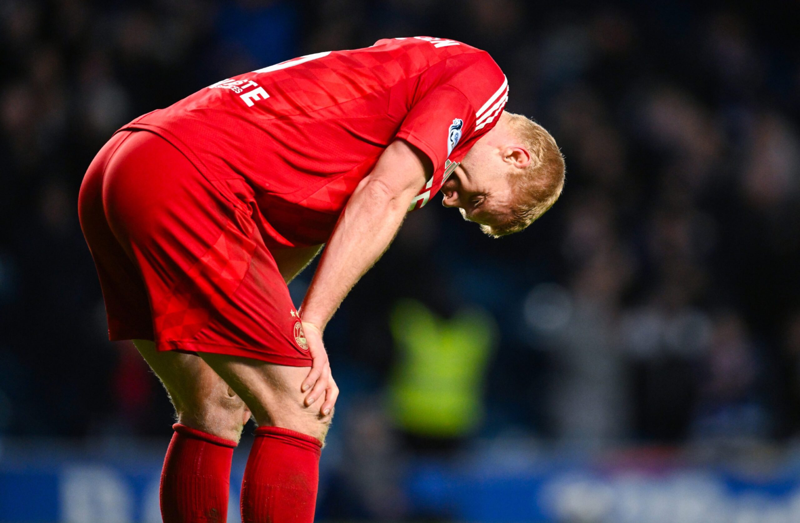 GLASGOW, SCOTLAND - JANUARY 15: Aberdeen's Sivert Heltne Nilsen looks dejected at full time during a William Hill Premiership match between Rangers and Aberdeen at Ibrox Stadium, on January 15, 2025, in Glasgow, Scotland. (Photo by Rob Casey / SNS Group)