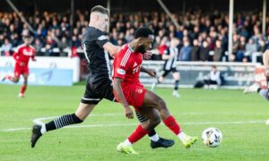 Aberdeen's Shayden Morris has a shot during the Scottish Cup tie at Elgin City. Image; SNS