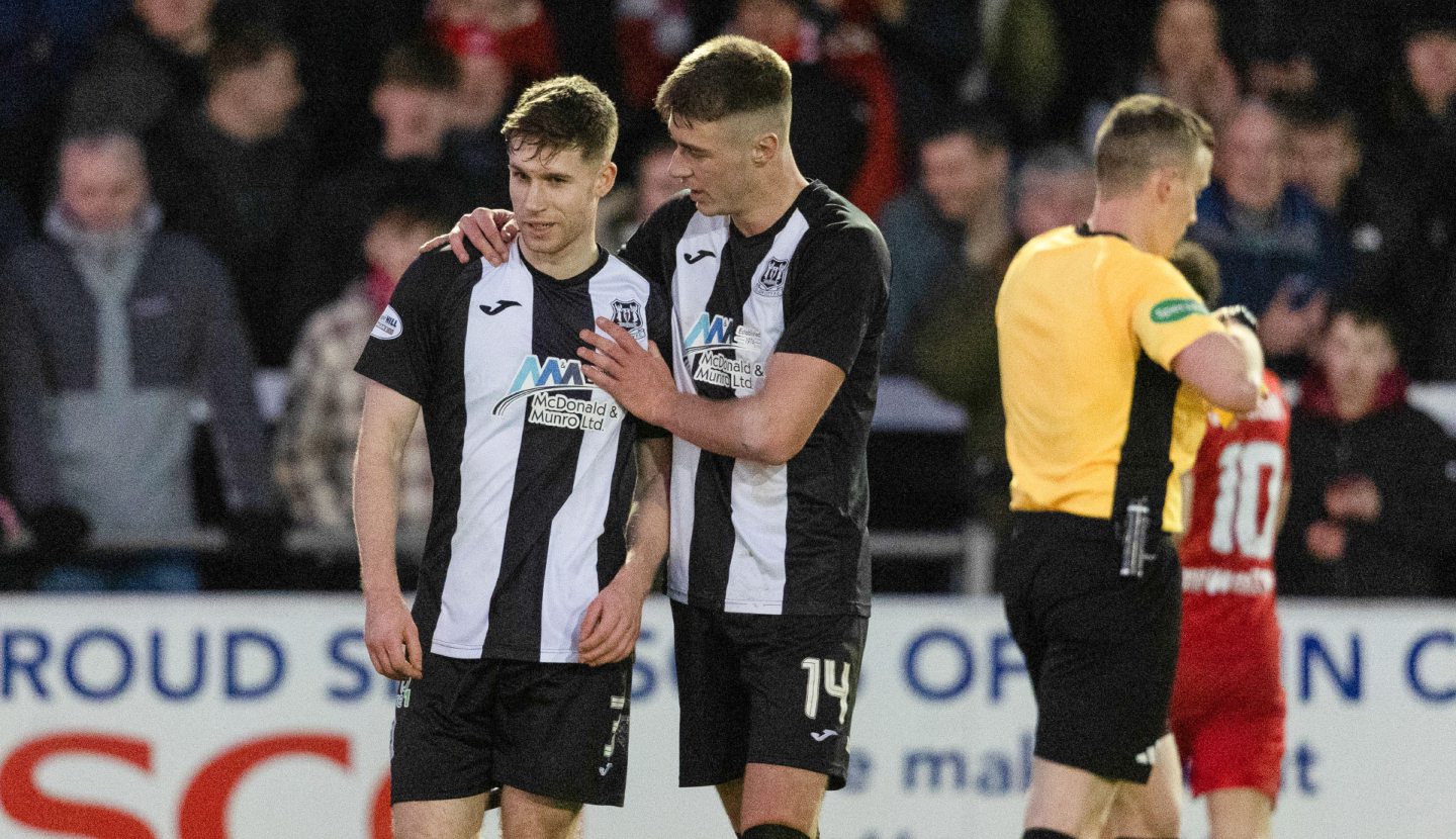  Elgin's Lyall Booth looks dejected after being sent off during against Aberdeen. Image: SNS 