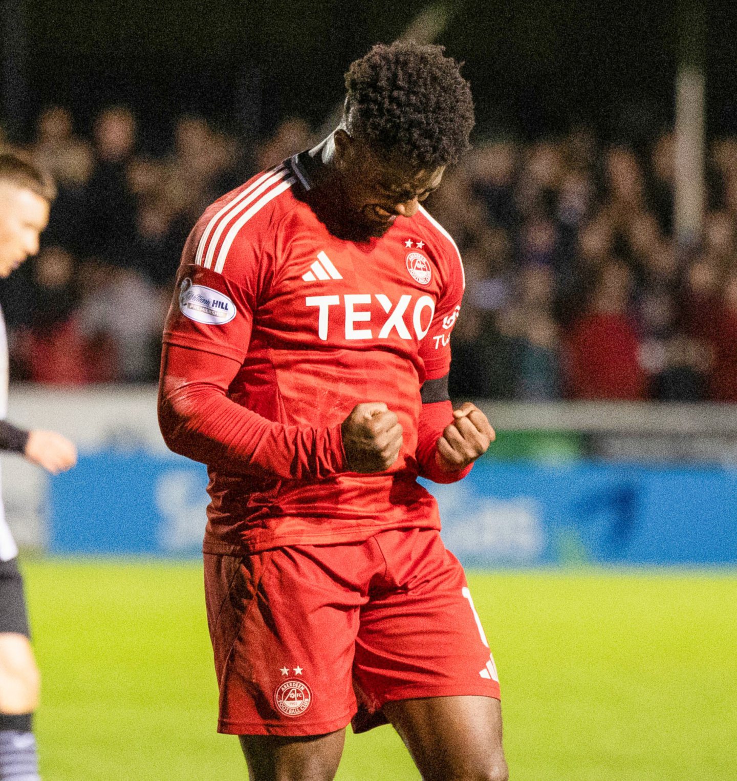 Aberdeen's Duk celebrates after scoring to make it 3-0 against Elgin City. Image; SNS 