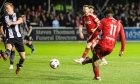 Aberdeen's Duk scores to make it 3-0 against Elgin City in the Scottish Cup. Image; SNS