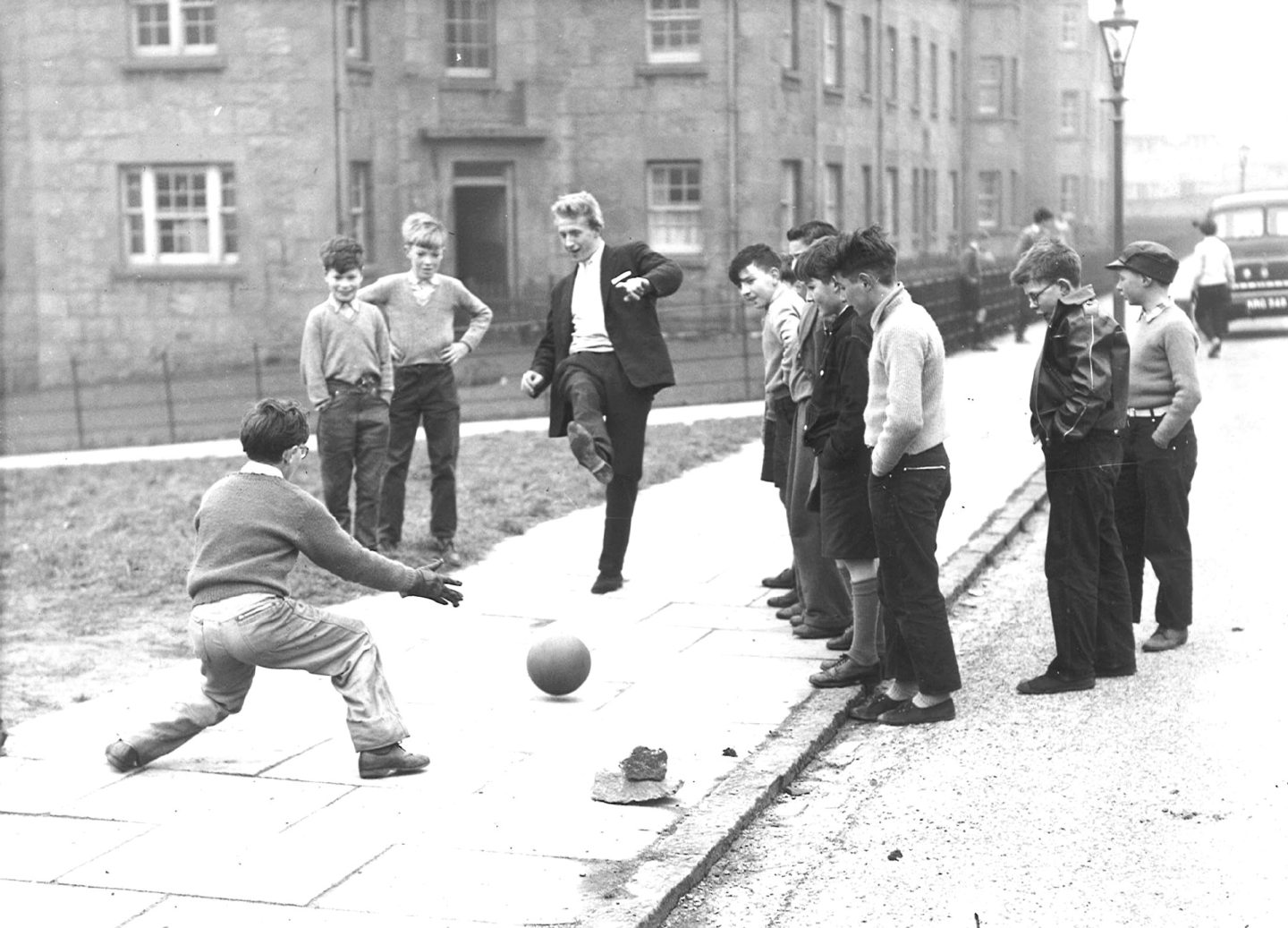 Denis Law, pictured on March 16, 1960 taking a penalty against Alex Irvine. on Printfield Terrace, near the junction with Printfield Walk. Image: Aberdeen Journals 