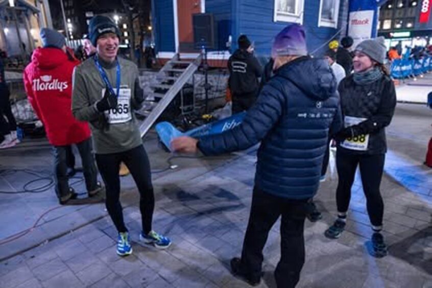 Aaron Cardno after he crossed finish line of PolarNorth Half Marathon