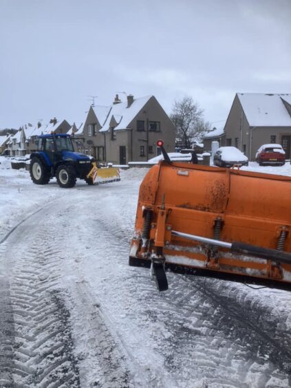 Farmers on snow plough duty in the north-east. 