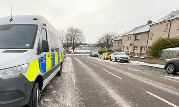 Police outside the property on Munro Place on January 12. Image: Tyler Mcneill.