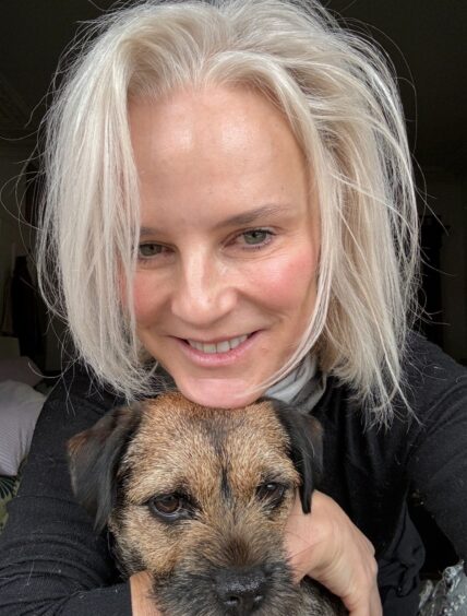 Fiona Hedges with one of her adorable dogs.