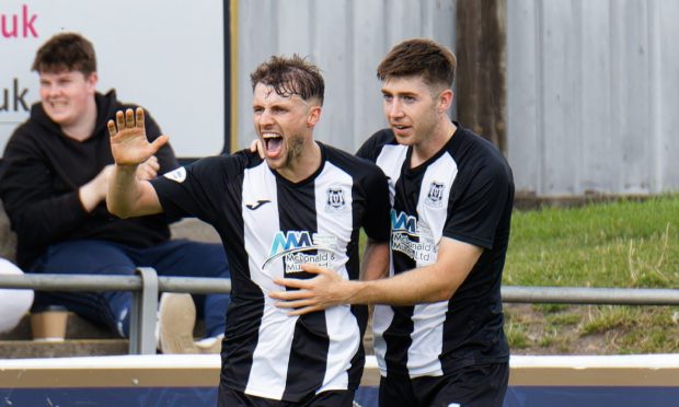 Ryan Sargent, left, celebrates with his Elgin City team-mate Mark Gallagher after scoring the final goal in a 4-2 League Two win over East Fife at Borough Briggs, Elgin, on Saturday, August 3, 2024.