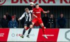 Wallace Duffy of Brora Rangers, right, jumps for a header with Fraserburgh's Aidan Sopel. Pictures by Jasperimage.